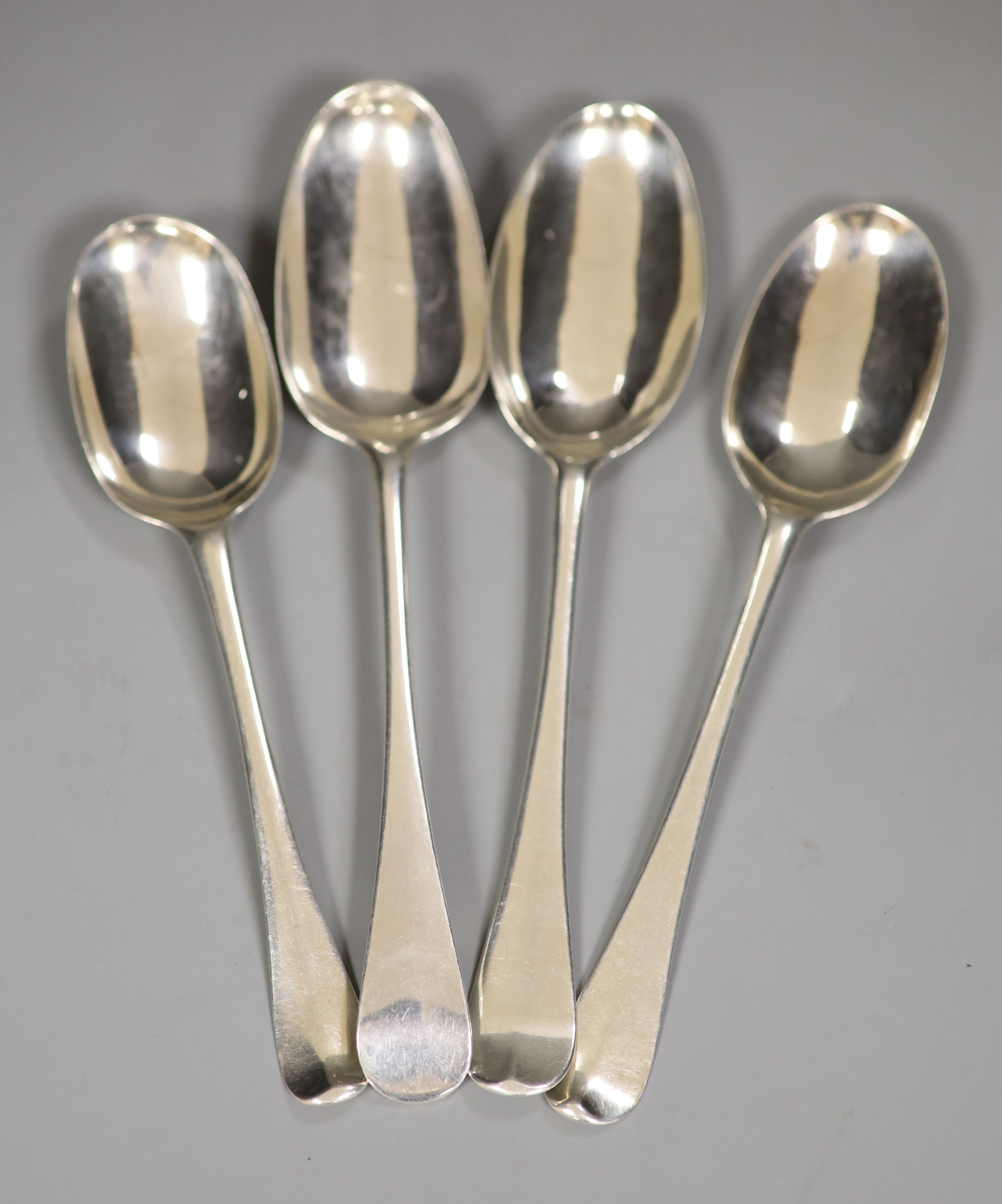 Four 18ct century base marked silver Old English or Hanovarian table spoons including WT, London, 1767, 6.5oz.